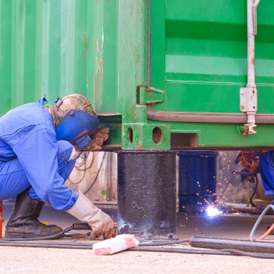 two-welders-are-welding-metal-fo